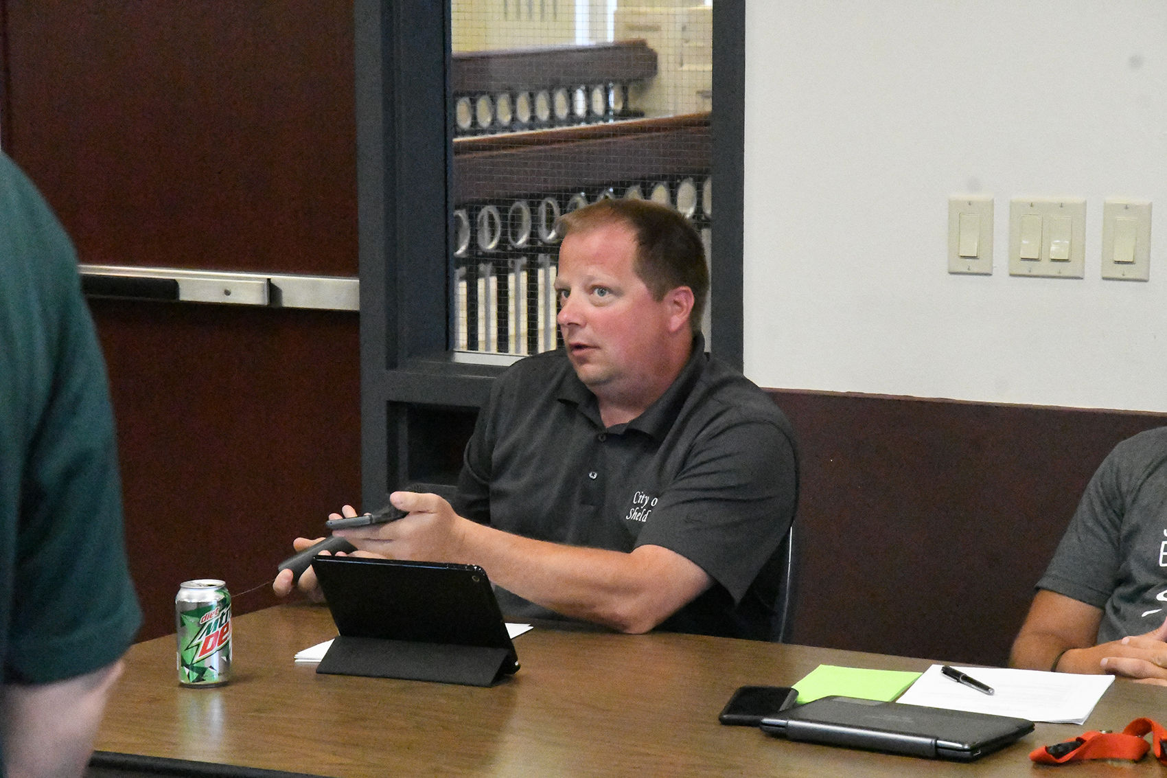 Todd Uhl holds phone
